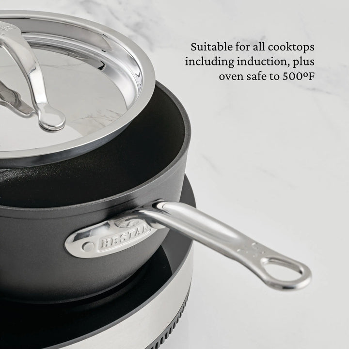 The TITUM® Fusion Nonstick Essential Pan with Lid, 4.5-Quart, features a black nonstick finish, metal handle and lid, and is suitable for all cooktops including induction—plus it’s oven safe up to 500°F.