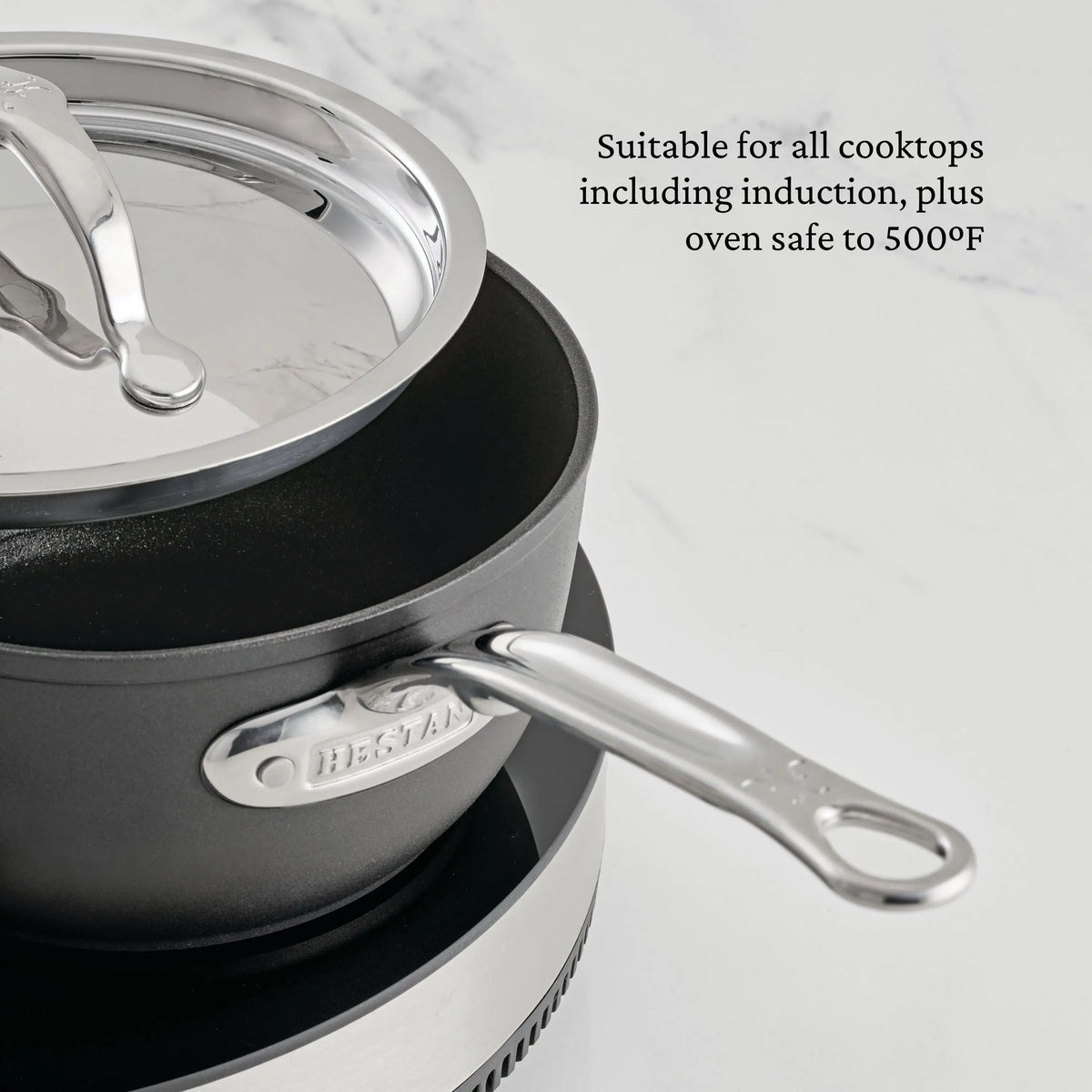The TITUM® Fusion Nonstick Essential Pan with Lid, 4.5-Quart, features a black nonstick finish, metal handle and lid, and is suitable for all cooktops including induction—plus it’s oven safe up to 500°F.
