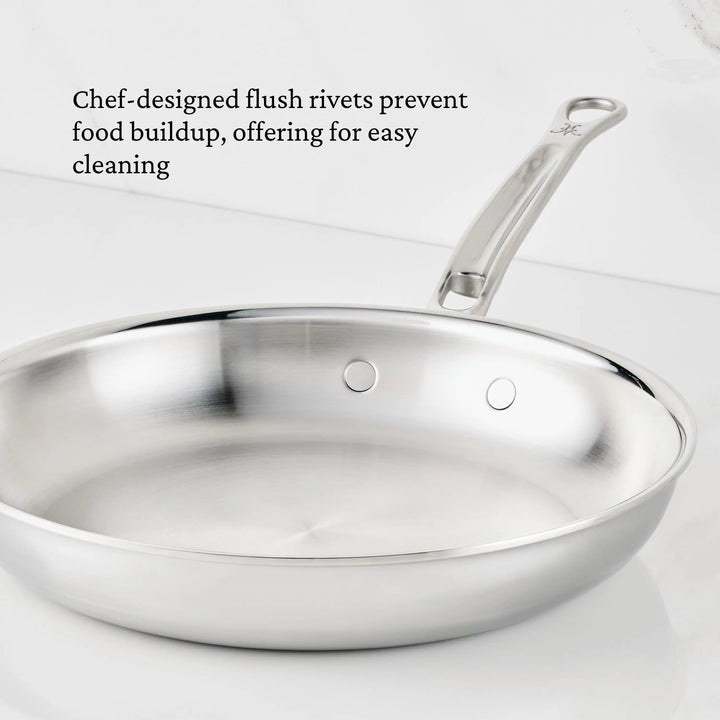 A ProBond® Luxe™ Polished Clad Stainless Steel Skillet with flush interior rivets and a metal handle is shown on a white background. Text highlights the easy-cleaning benefit of this premium stainless steel cookware.