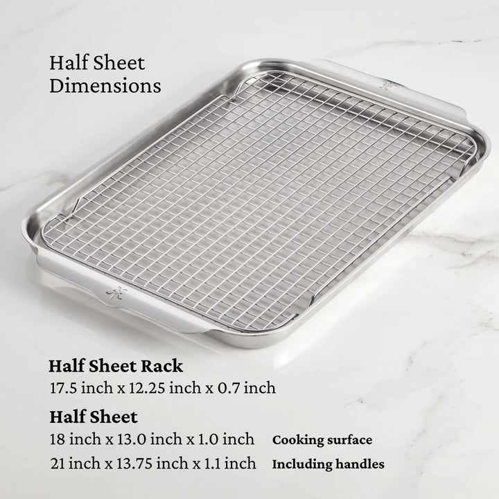 A metal half sheet pan with a wire rack sits on marble, alongside the dimensions in black text, highlighting the Hestan OvenBond Tri-ply 3-Piece Set—durable stainless steel pans ideal for any ovenware collection.