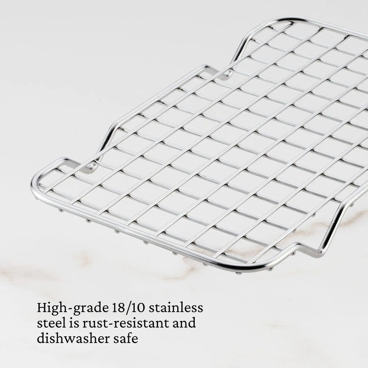 The Hestan OvenBond Tri-ply Mini Eighth Sheet Pan with Rack is shown. Made from high-grade 18/10 stainless steel, it's rust-resistant, dishwasher safe, and perfect for use with your favorite stainless steel sheet pan.