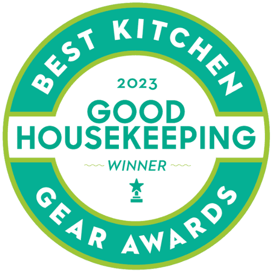 Circular badge for Best Kitchen Gear Awards from Good Housekeeping. It says 2023 Good Housekeeping Winner in the center, surrounded by a turquoise and green border. A small star icon is below the text.